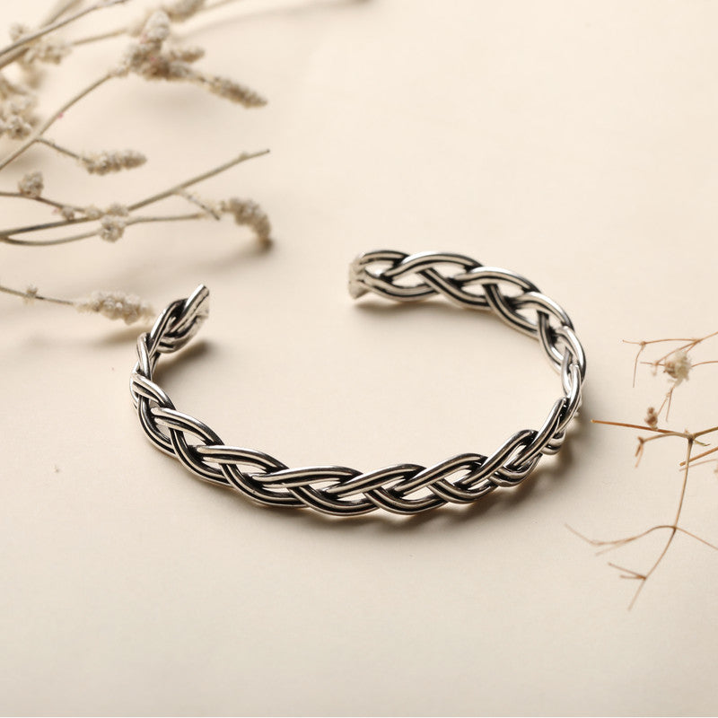 Silver Open Torque Cuff Vintage Kada prop display highlighting design details