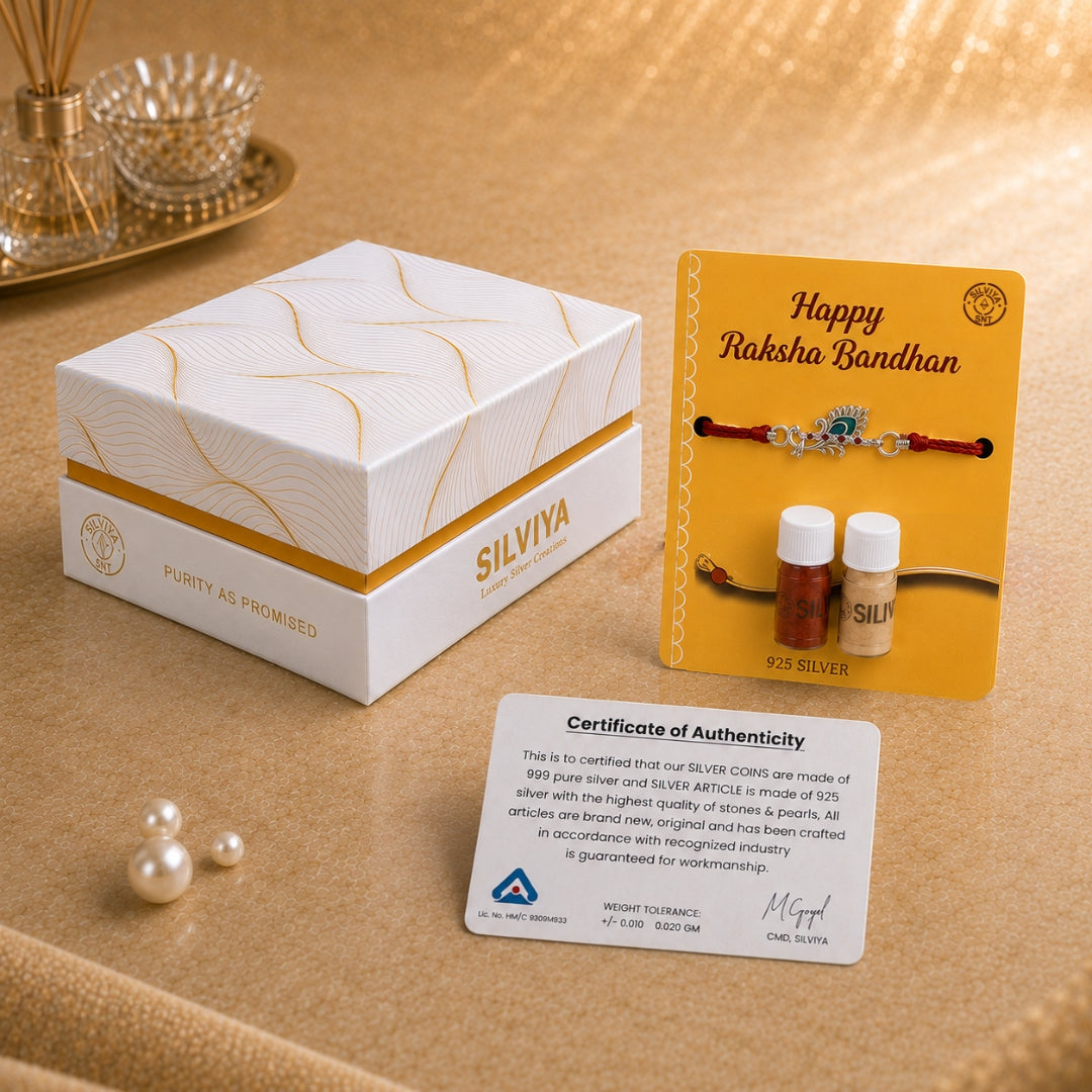 Premium Silviya gift box packaging for Silver Pankh Bansuri Rakhi with purity card – perfect Raksha Bandhan gift.