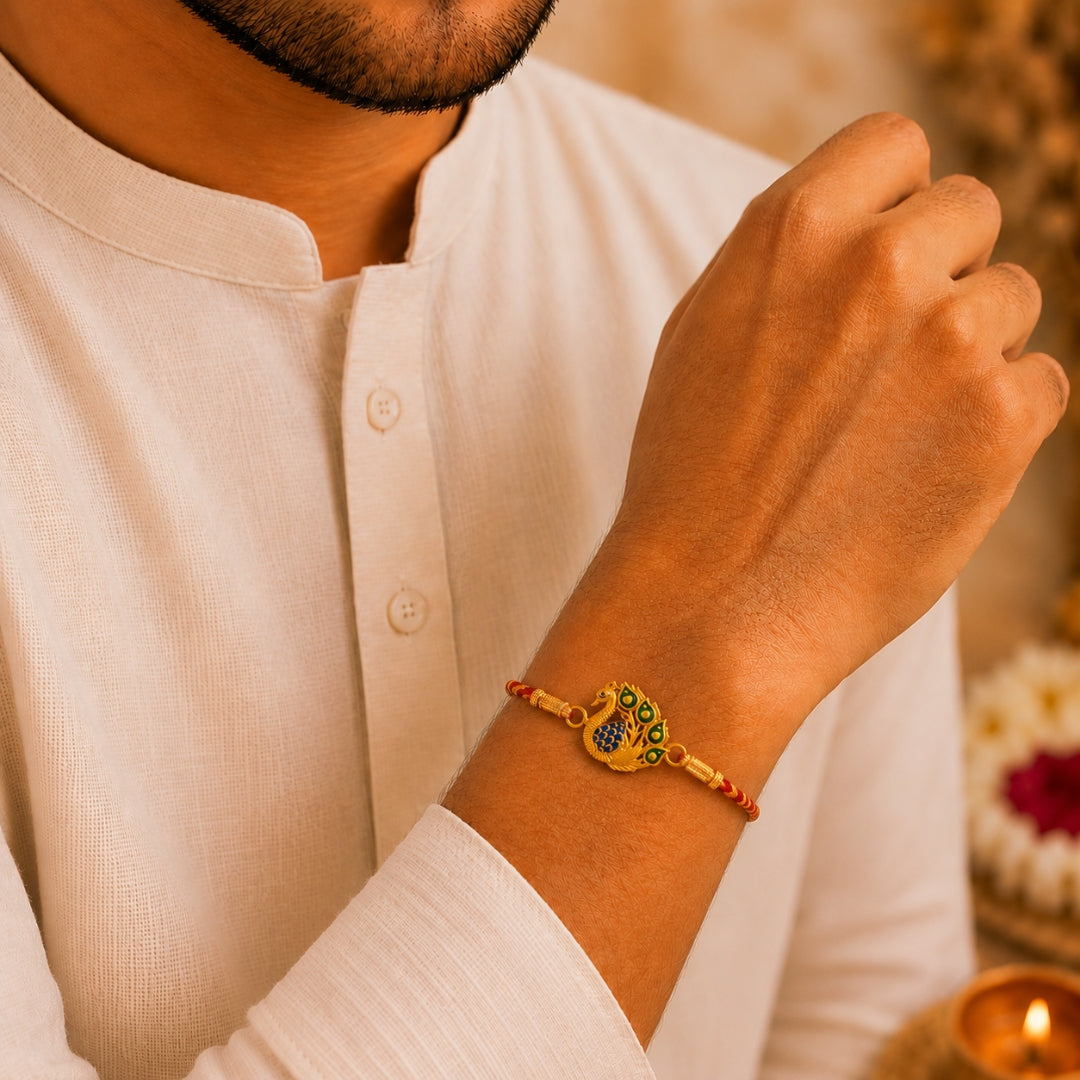 Brother wearing Silver Peacock Meena Art Rakhi by Silviya – 925 silver rakhi for Raksha Bandhan.