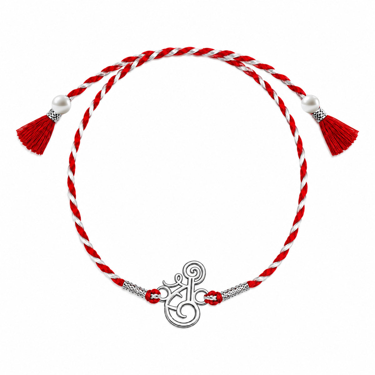 Close-up of Silver Shree Design Rakhi with red and white thread