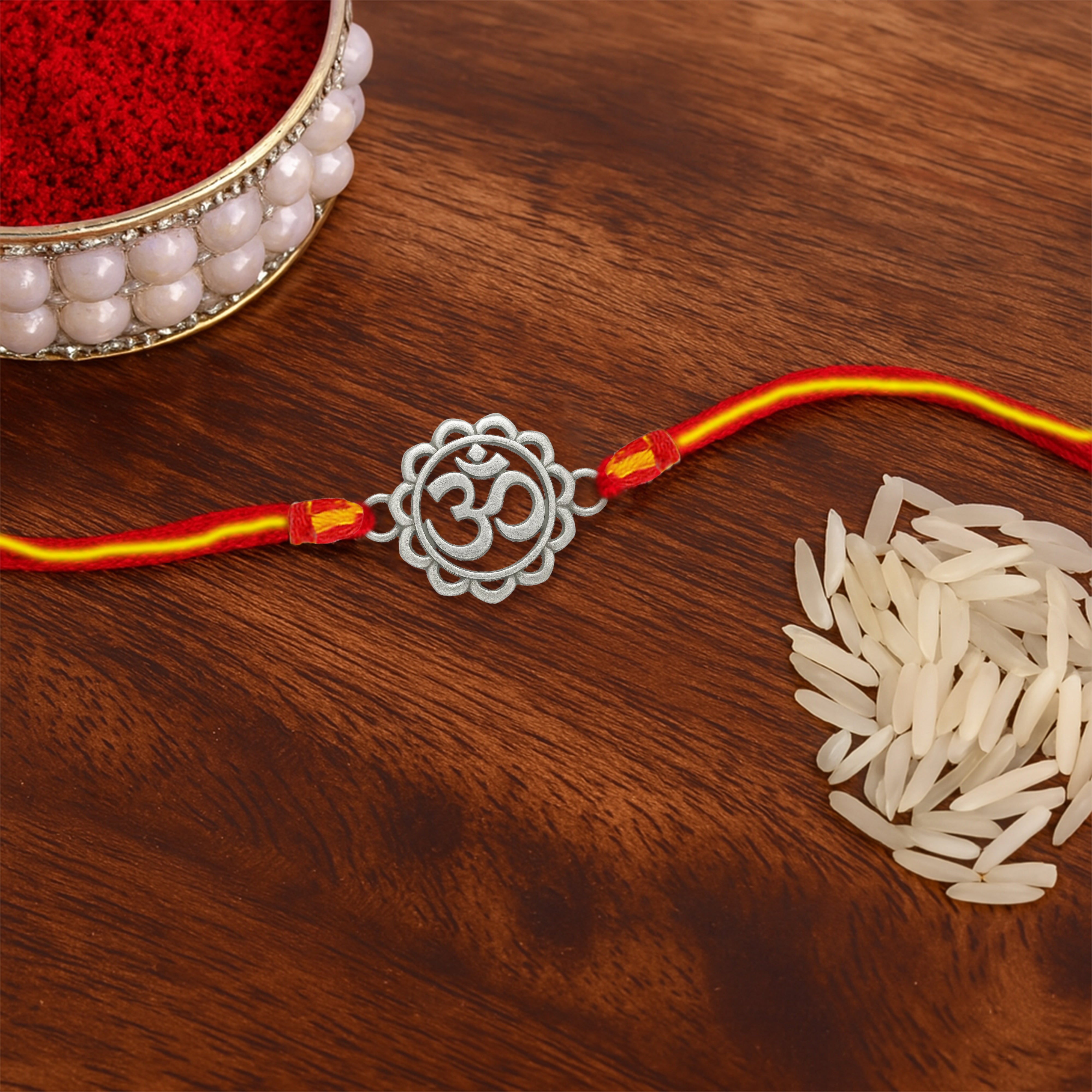 Silver rakhi for brother with Om symbol – original silver rakhi design with price for Raksha Bandhan gift
