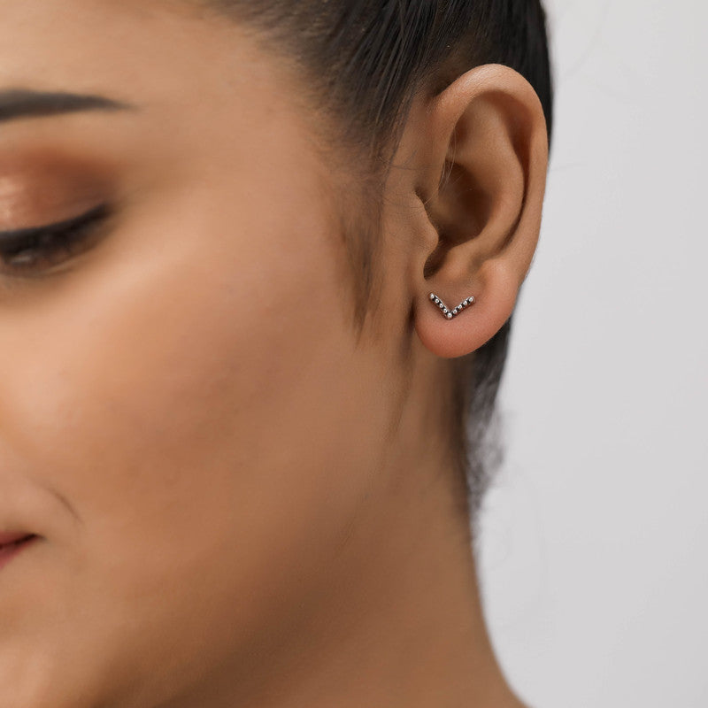 Girl wearing Sterling Silver V-Shaped Stud Earrings – perfect Raksha Bandhan and festive gift for sisters and loved ones.