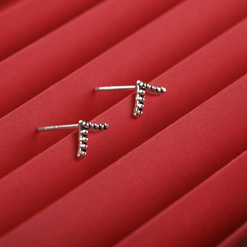 Sterling silver V-shaped stud earrings – trendy festive jewelry for Diwali, Bhai Dooj, and Karwa Chauth gifting.