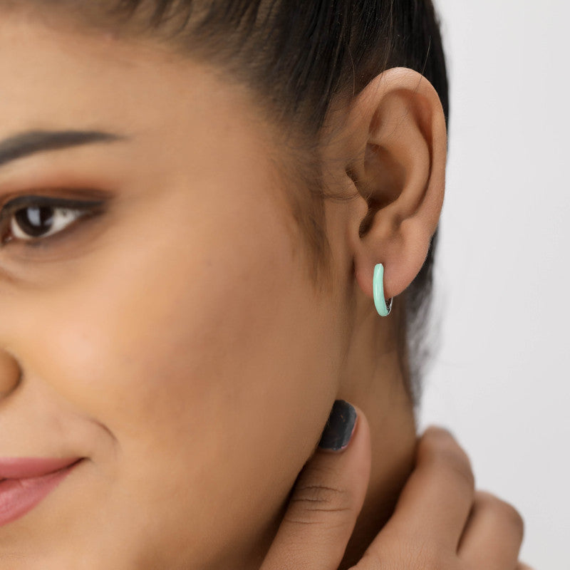 Trendy sterling silver Bali hoop earrings on model – perfect festive jewellery for Karva Chauth, Raksha Bandhan, and parties.