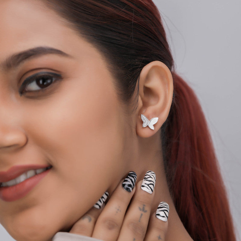 Trendy sterling silver butterfly stud earrings on model – perfect festive jewellery for Karva Chauth, Raksha Bandhan, and parties.