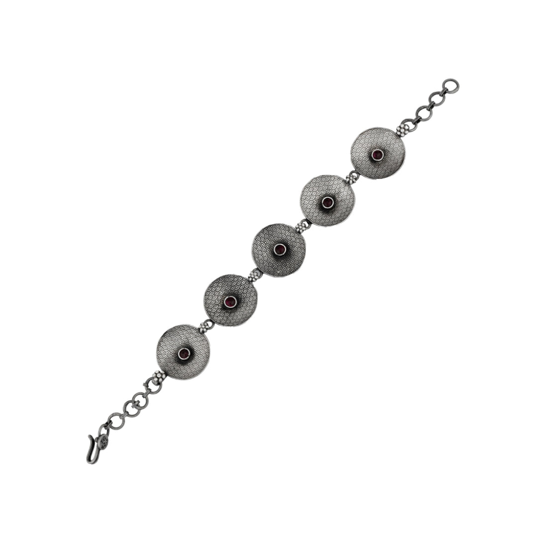 Close-up of a Victorian oxidised silver bracelet with vintage details.
