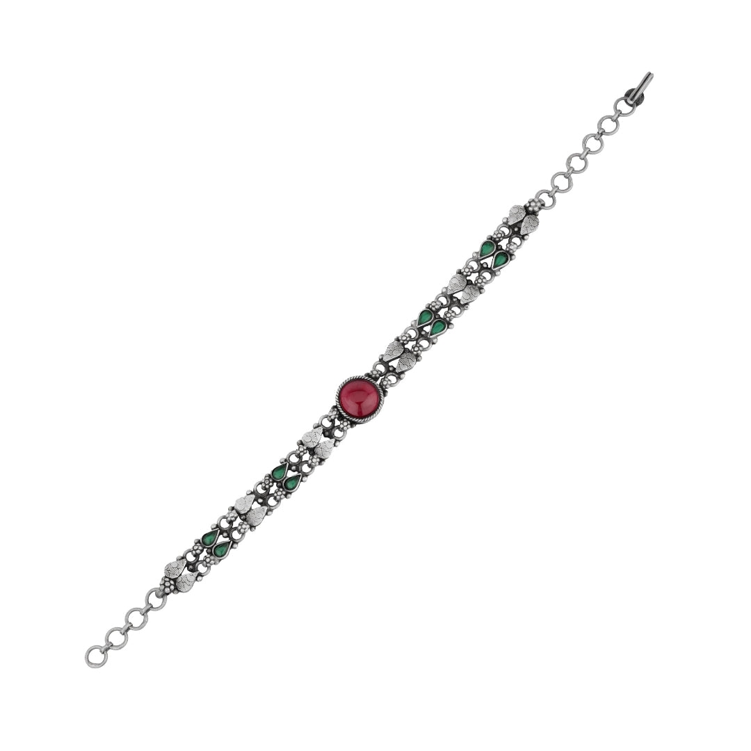 Close-up of antique silver layered chain bracelet design.